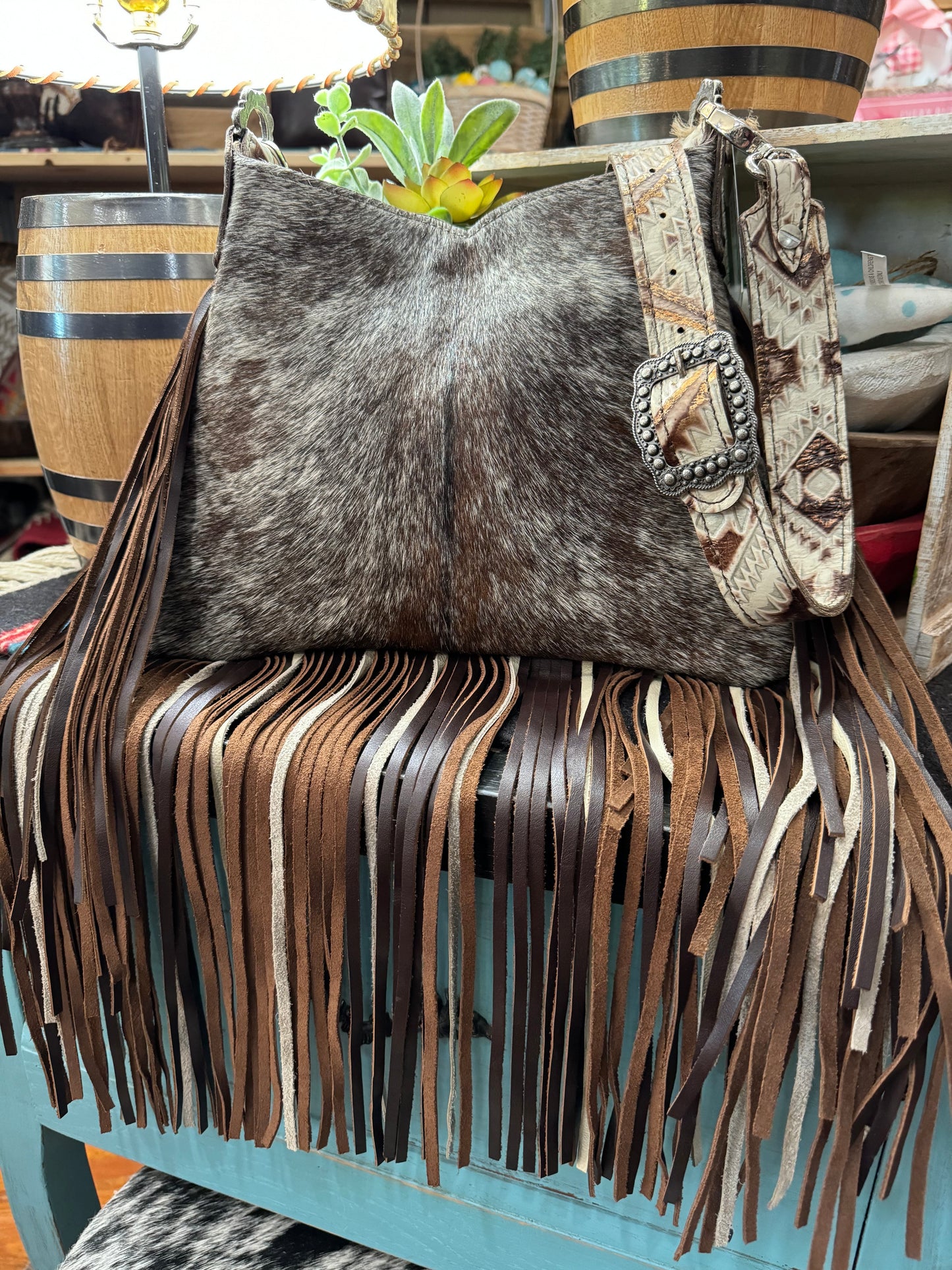 Hobo, Small   brown and white speckled hide with brown bronc