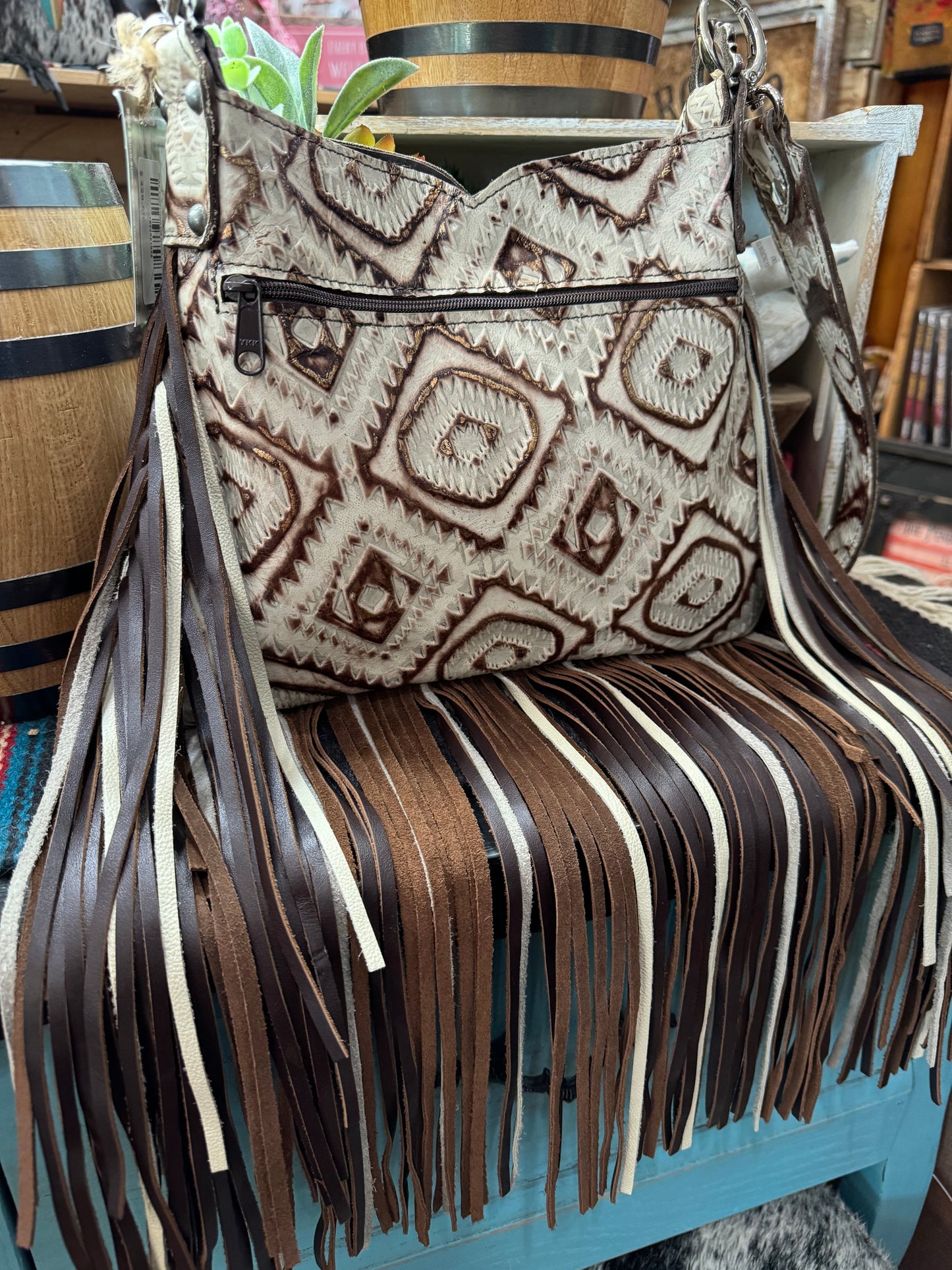 Hobo, Small   brown and white speckled hide with brown bronc
