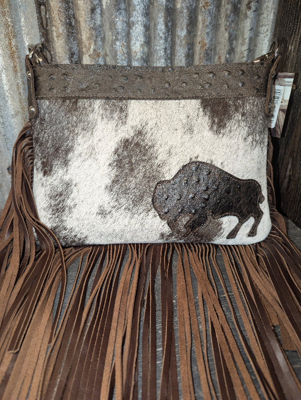 Half Pint, White and brown spotted hide with brown leather
