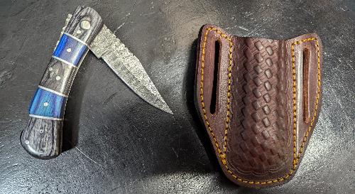 Knife  - Folding pocket style with leather sheath